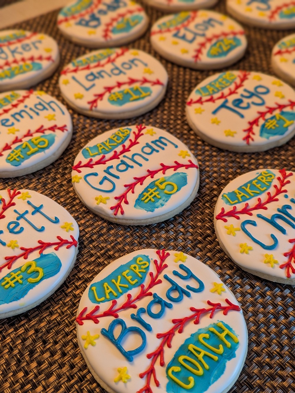 Decorated baseball cookies iced with each player's name and number