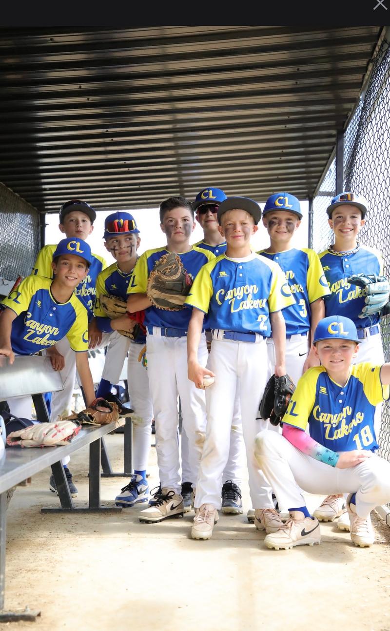 Canyon Lakers team in the dugout
