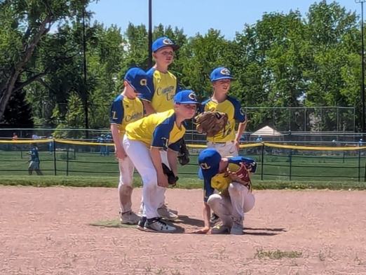 Canyon Lakers infielders set between pitches