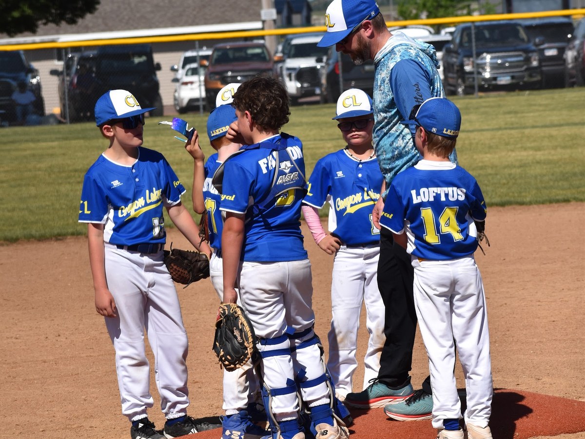 Infielders and a coach gathered on the mound during a visit